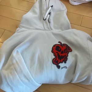 Beige hoodie with red design